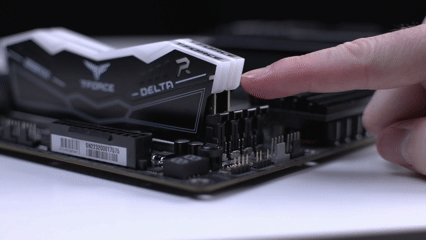 Releasing the RAM from motherboard clips